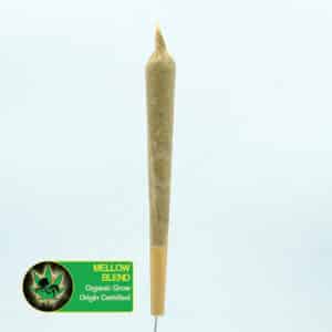 Close up photo of the a pre-rolled joint of Thai and Laos landrace cannabis strains blended. Text next to the flower states the name of the strain, that it is organically grown, and is origin certified.